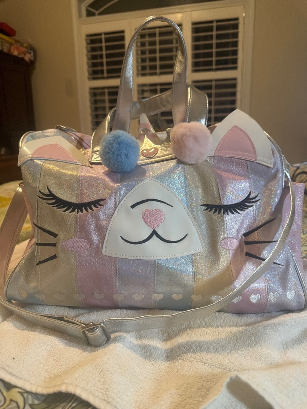 Under One Sky weekender Caticorn duffel bag.